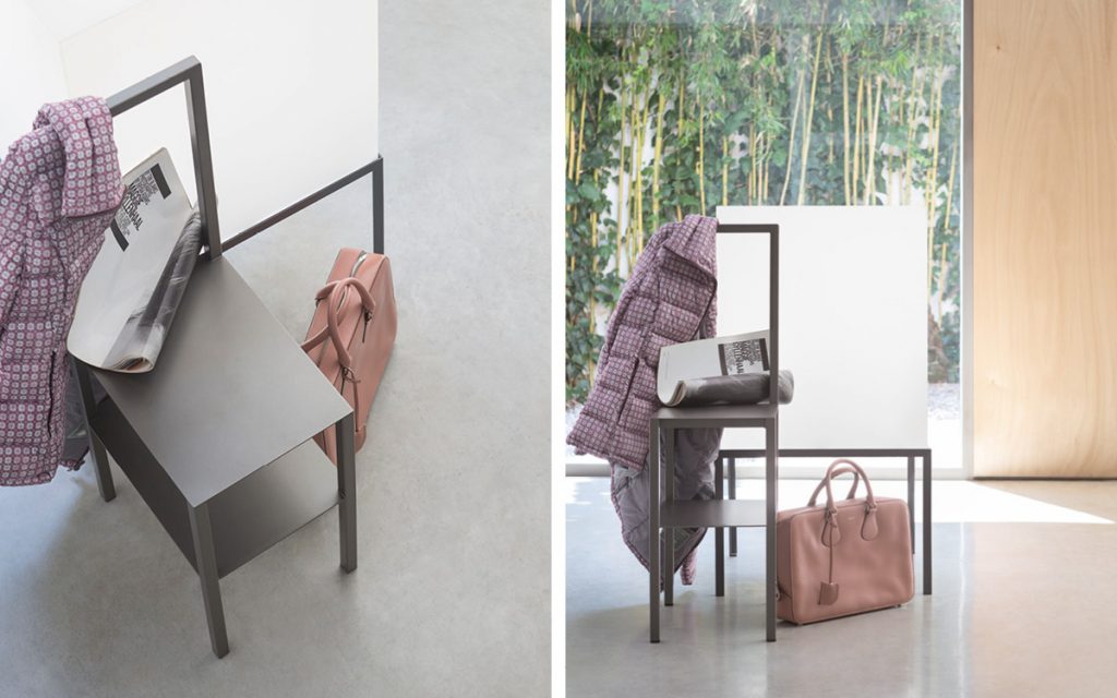 Two anodic bronze Servomuto with double function chair/coat stand on a black background.