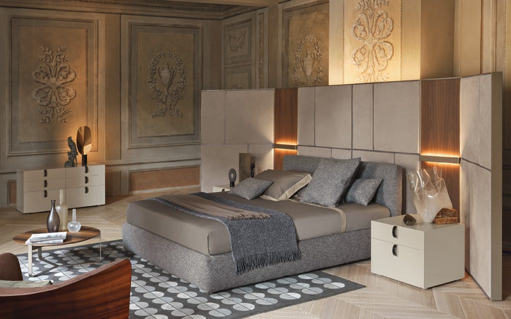 Four square Splendor Night Table, structure in white with black nickel handles in a bed room.