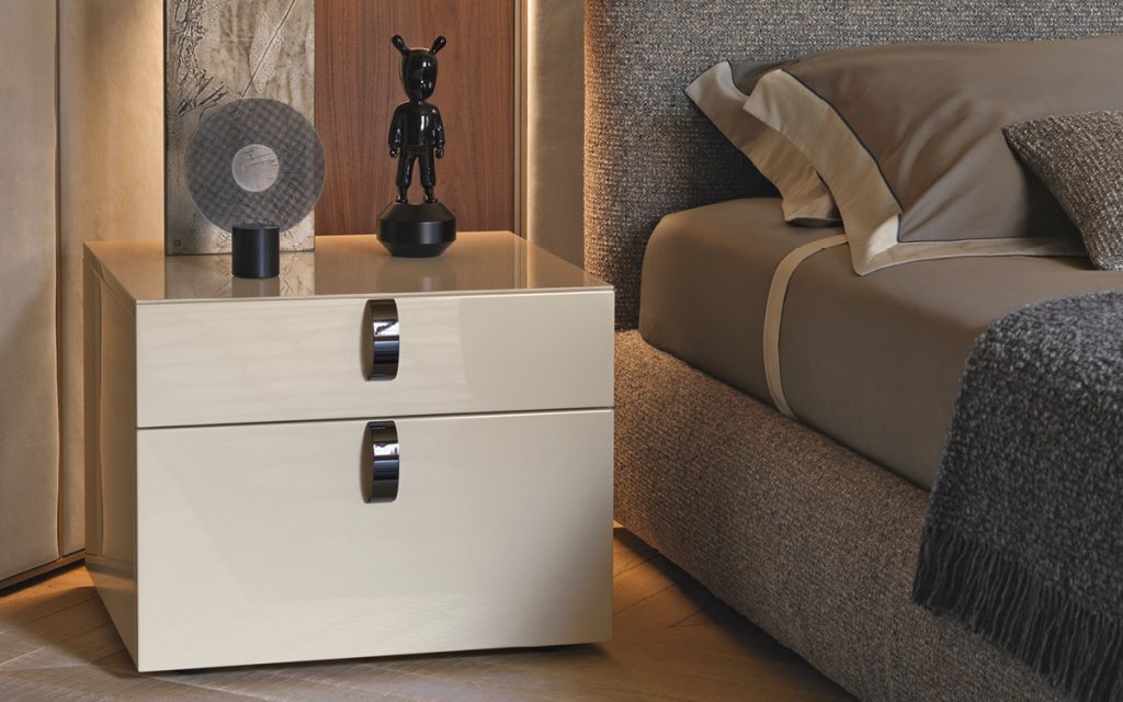 Square Splendor Night Table, structure in white with rectangle black nickel handles in a bed room.