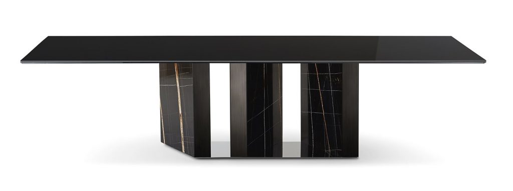 Platinum table. Large rectangle top and central leg in black and yellow with mirrors on a white background.