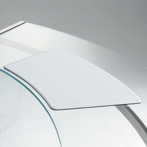 Sottomano white leather pad on a desk.