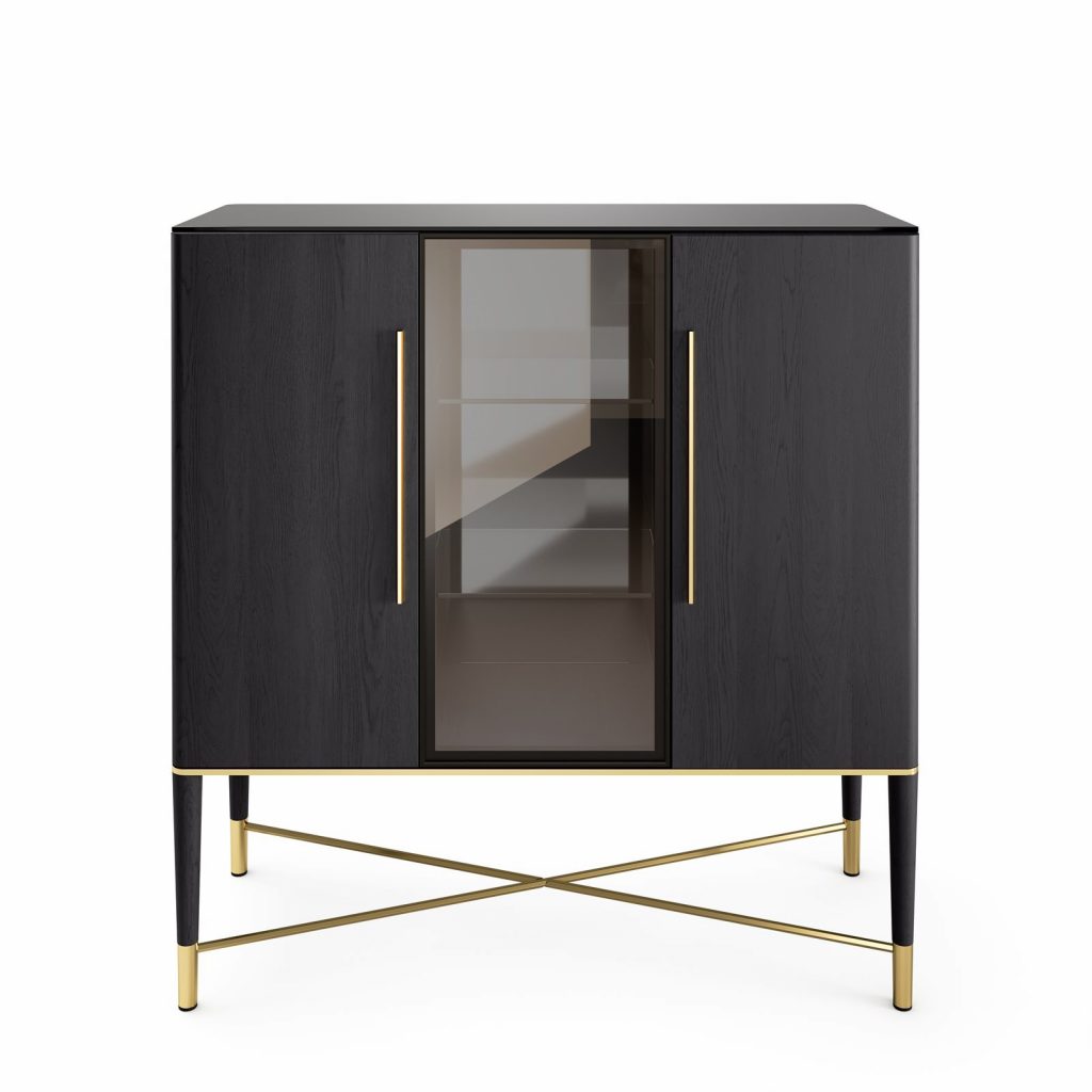Tama Vitrine: A tall glass display cabinet with a black and gold metal frame on a white background.