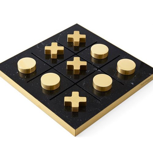 Tip Tap Toe square table game. Base in black and gold , pieces in gold on a white background.