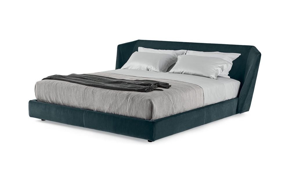 Xeni bed. Headboard and base in green fabric on a white background.