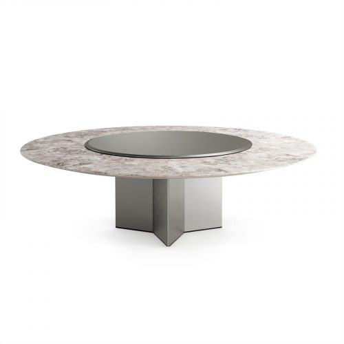 Yol Sect table, Round top in white and brown marble and silver central circle. Central leg in gray on a white background.