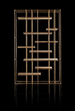 Cage B bronze metal frame bookshelf with wood shelves on a black background.