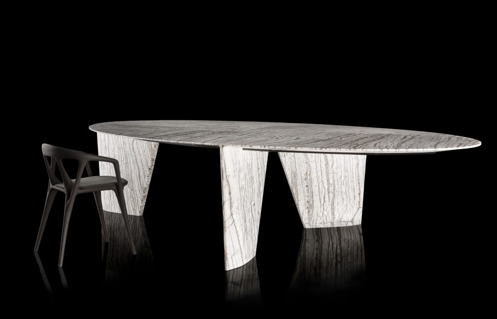 Round Synapses Table with three legs, white and black marble lines on a black background.