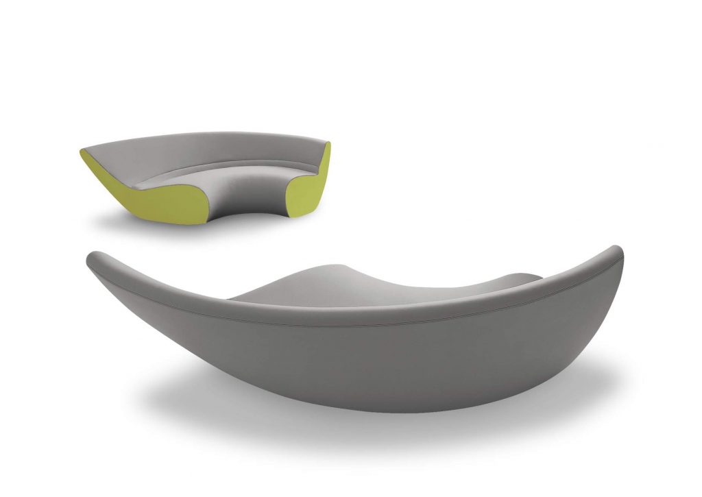 Two Circle sofas with curved shape upholstered in white and yellow on a white background.