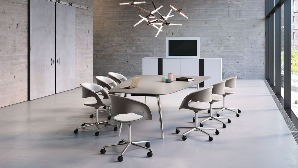 Media Sideboard featuring a wooden frame with sliding doors in white finish, and open compartments in a office.
