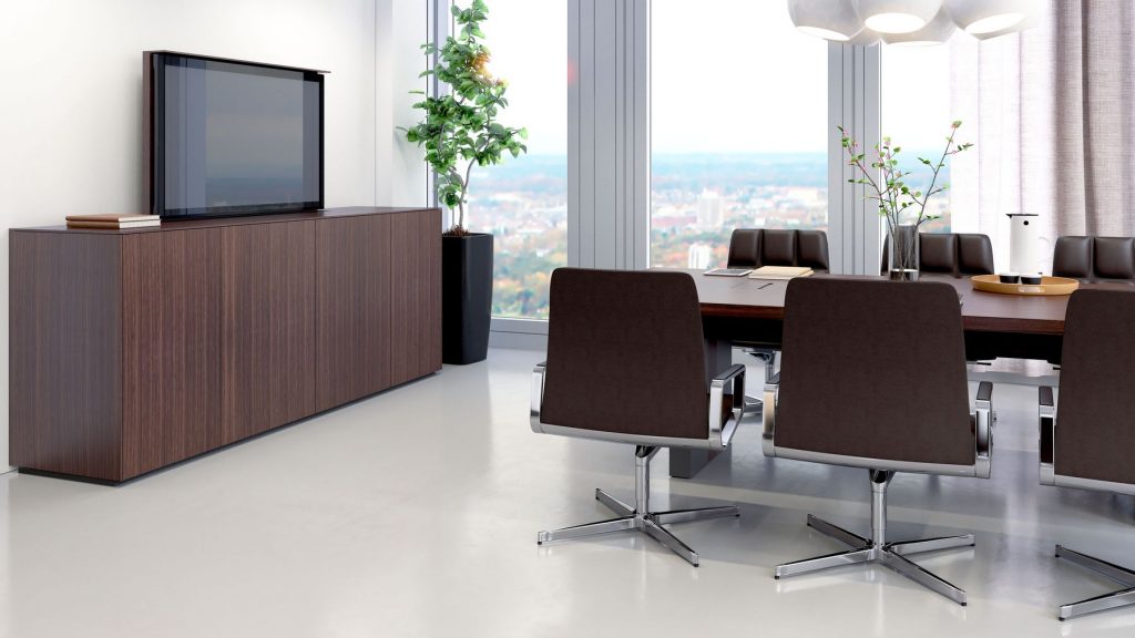 Media Sideboard featuring a wooden frame with sliding doors in brown finish, and open compartments in a office.