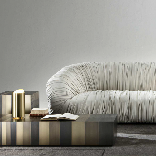 Leathers finish sample in a white color in a sofa in a living room.