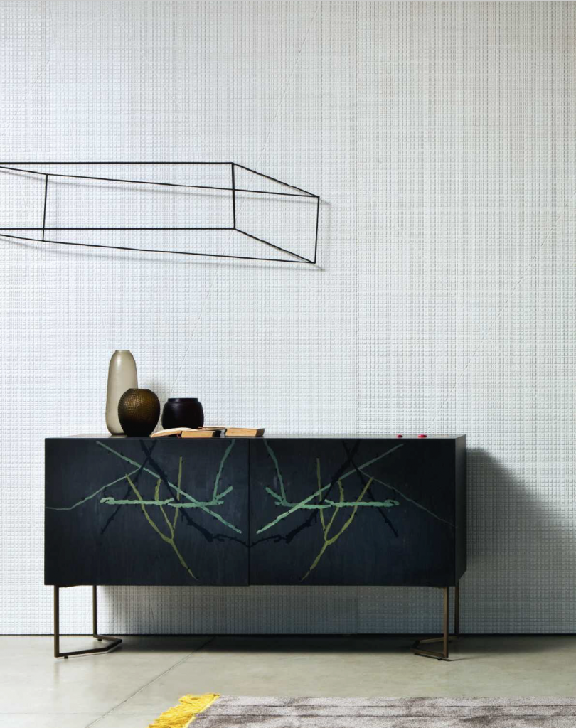 Maxima finish wood sample in white color with rough texture, set against a wall.