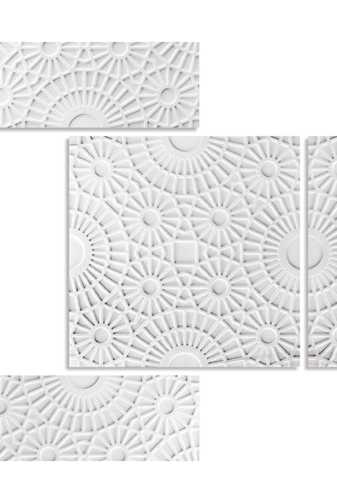Merletto finish mosaic in white with lace-like patterns on a white background.