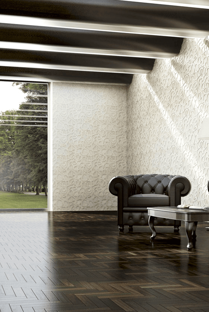 Picto finish mosaic in white with pictographic patterns on the wall in a living room.