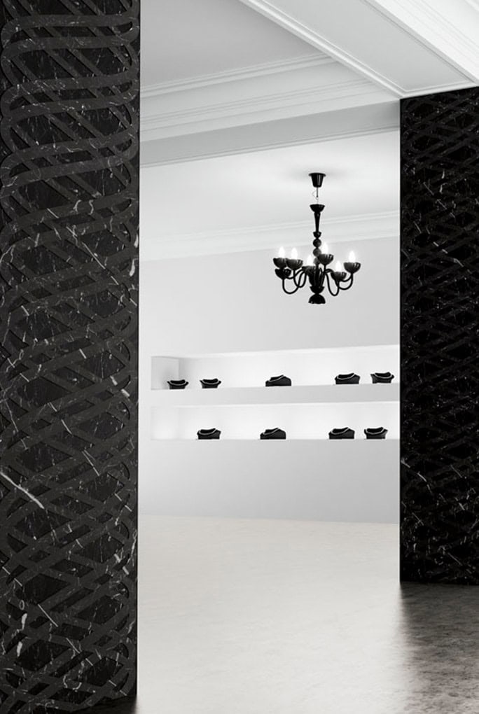 Twirl finish marbl in black and white color with swirling patterns in the columns in a store.