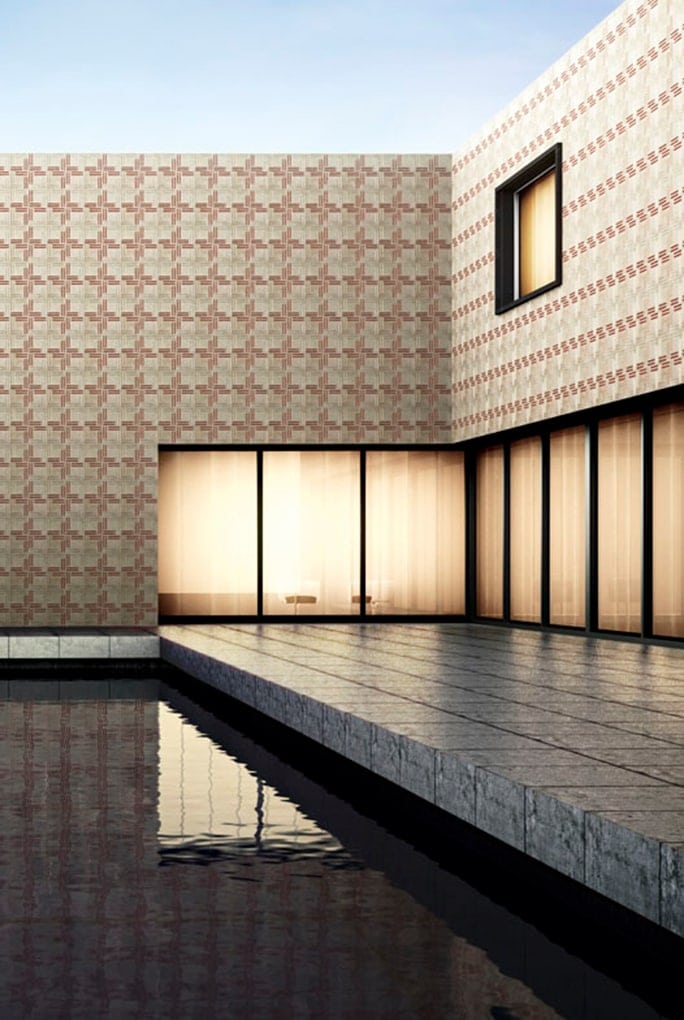 Weave finish marble in white and orange color with woven patterns, on the wall of a house.