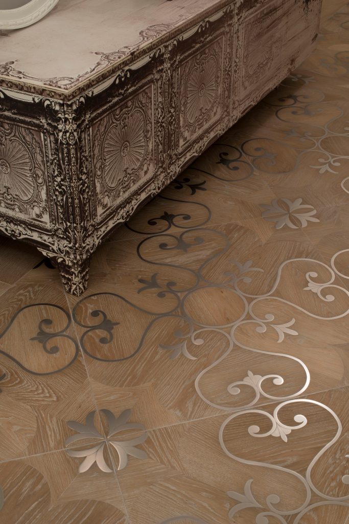 Inlay mosaics natural wood finish with silver flower like patterns.