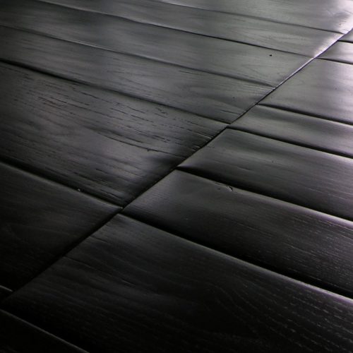 Trapezoidal Planks in black with rectangular shapes.