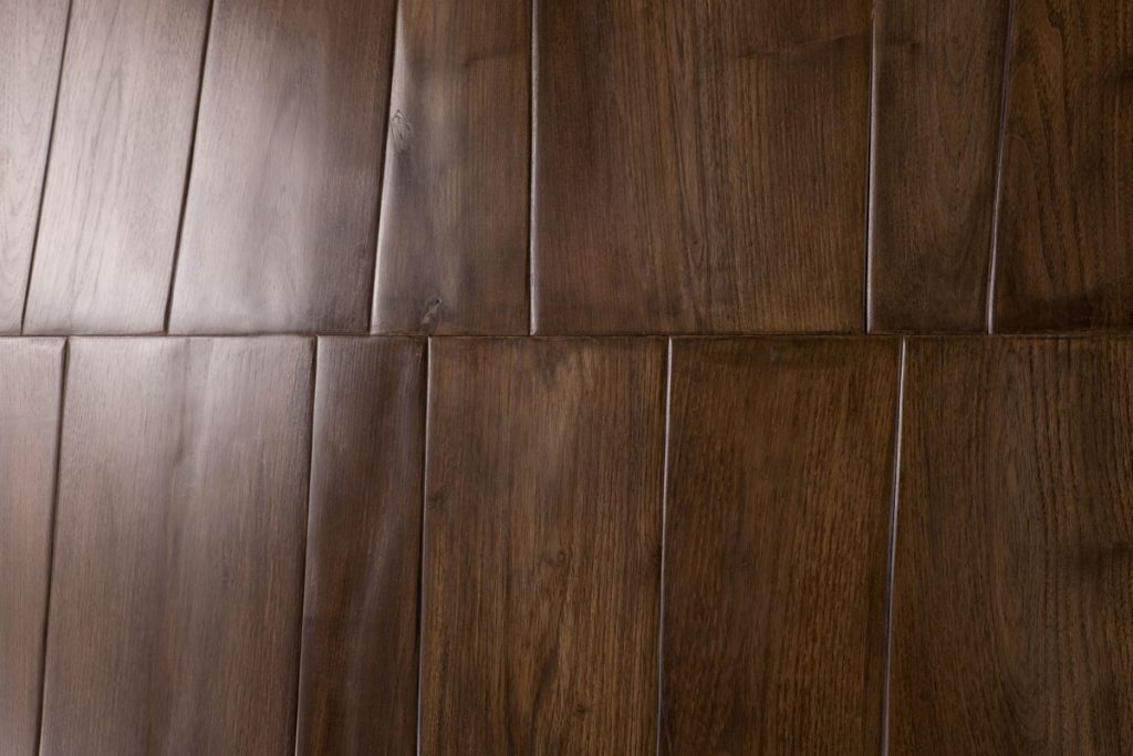 Trapezoidal Planks in brown with rectangular shapes.
