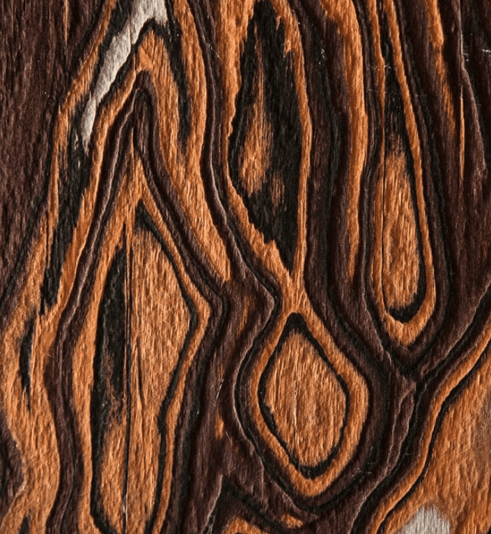 Bark material sample with bark-like texture in dark brown and black tones.