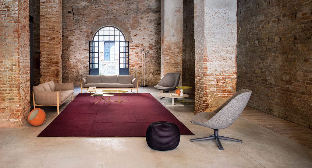 Quadri Double in red square felt modules in a living room.