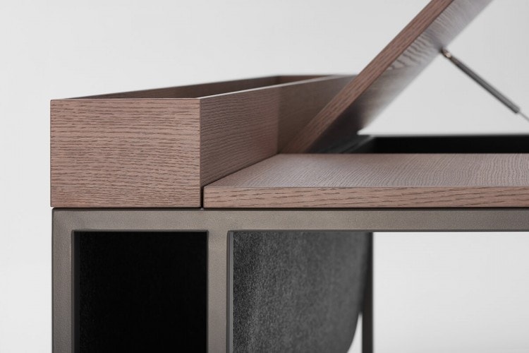 Close up of a Twenty Venti Home & Home Light desk, top in light brown, bronze steel frame and legs, desk has a drawer that can be accessed through a flap door on the desktop with hydraulic lift on a white background.