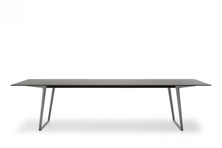 A Axy table, top and two legs in black aluminium on a white background.