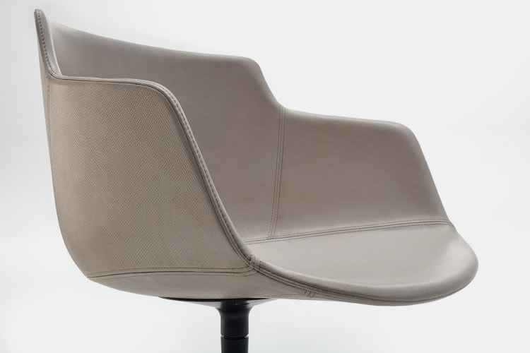 One top of a white Flow Leather chair on a white background.