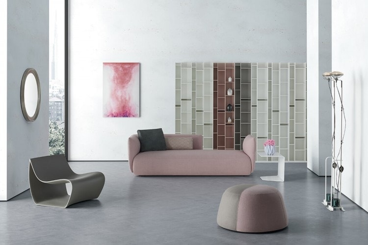 A powder pink and brown Fuji seat in a living room background