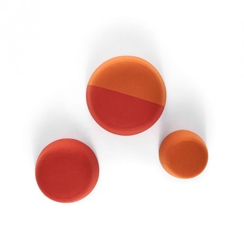 Three Fuji seats of different dimensions. Two in rust color and one in rust and orange color on a white background.