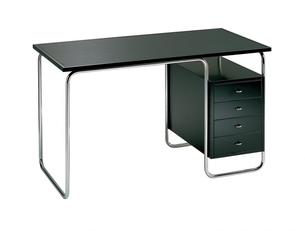 Comacina desk with a rectangle black top, black drawers and metal legs on a white background.