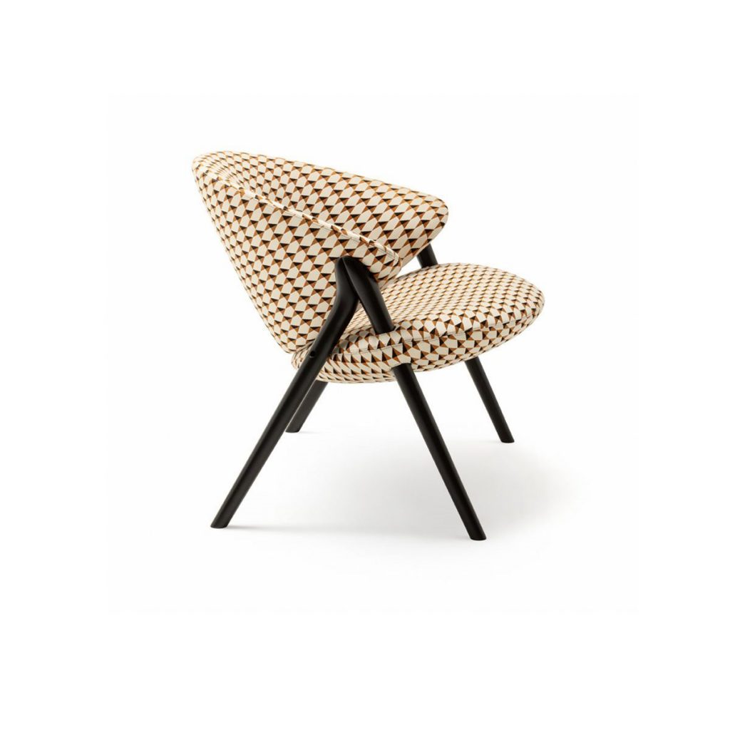 Oliva chair featuring a black frame and a white and yellow upholstered seat and backrest with triangles pattern on a white background..