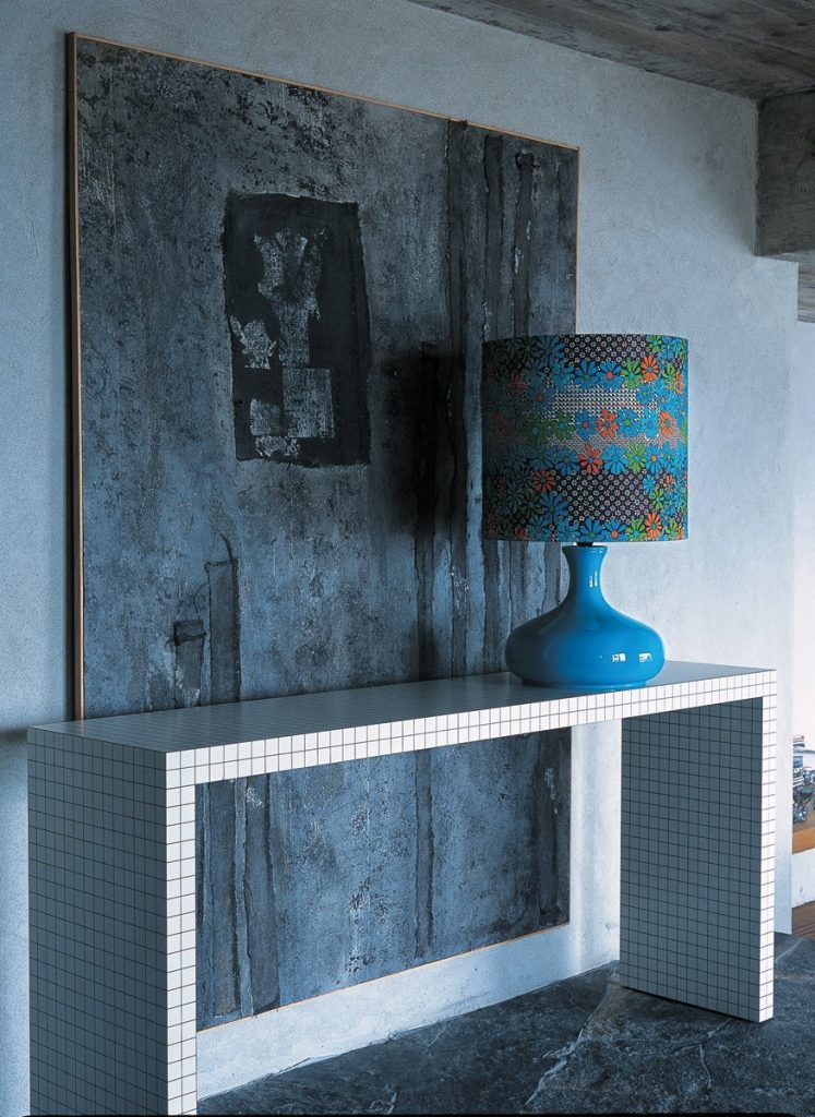 Quaderna bench with a rectangle design, featuring a white grid pattern on all surfaces in an entrance hall.
