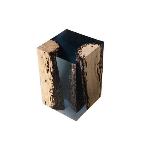 This stool combines natural wood textures with transparent resin, producing a striking design that highlights the organic grain in a modern shape.