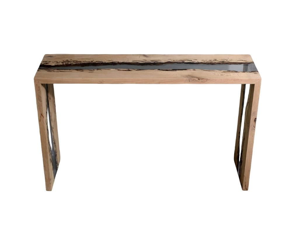 A refined console table crafted from bent natural wood and clear resin, the Bent River Console highlights organic textures with a sleek, contemporary form. Perfect as an entryway or accent piece, it brings warmth and modern elegance to any space.