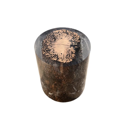 This stool combines natural wood with a resin finish that magnifies the grain like a fisheye lens, creating a bold organic pattern with modern sculptural appeal.