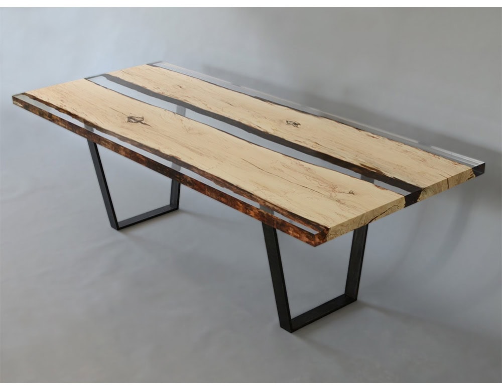This console table blends natural spalted wood with clear resin, creating a striking mix of raw texture and smooth transparency. Supported by a slim black leg, it offers a modern yet organic design statement.