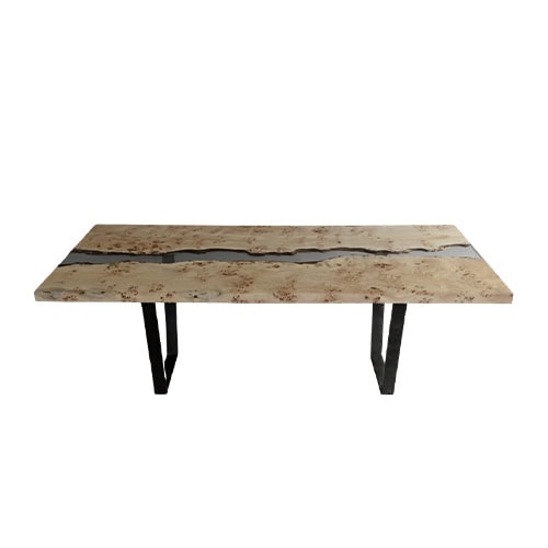Poplar River Dining Table displays a pair of light poplar slabs split by a winding resin channel. With textured wood grain and clean metal legs, it blends organic warmth with modern elegance.