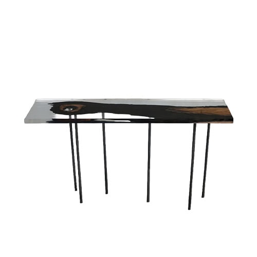 Wetland Relic Console highlights raw timber preserved in glossy resin, supported by slender metal legs. A striking design merging organic texture with contemporary elegance.