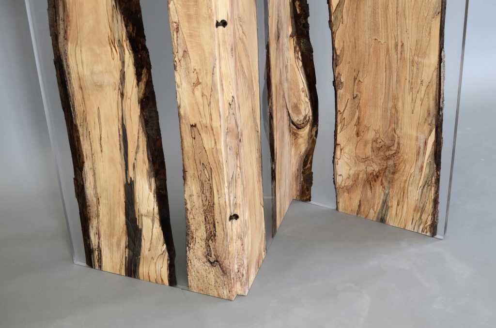 Closeup of Fungi Screen with an organic design, made of wood with a natural finish and featuring transparent resin inlays, set against a white background.