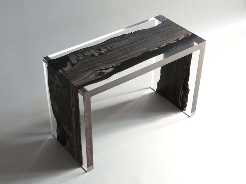 Peatland Bench/Low Table with a rectangular shape, featuring a natural wood finish and clean lines, set against a white background.