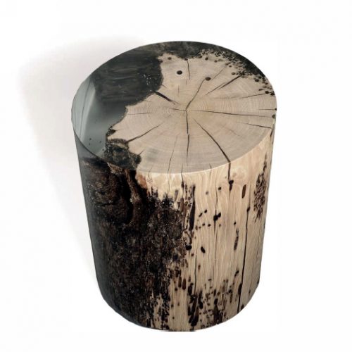 Fisheye Stool/Side Table with a rounded shape, made of solid wood with a natural finish, set against a white background.