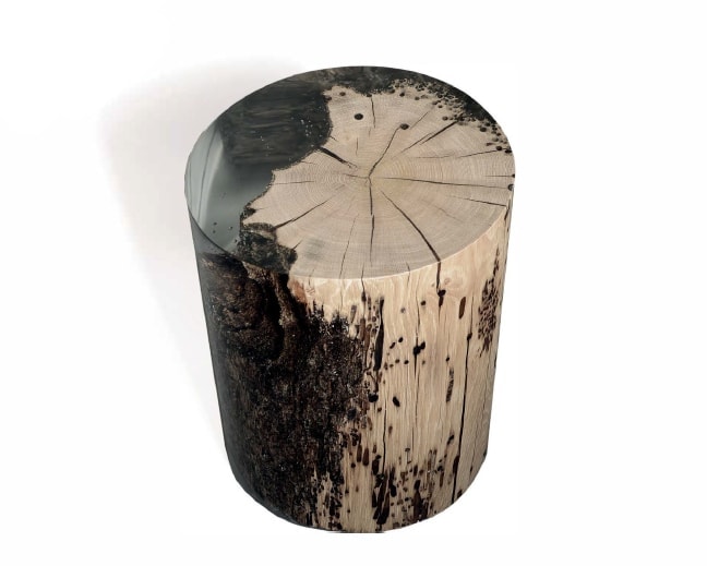 Fisheye Stool/Side Table with a rounded shape, made of solid wood with a natural finish, set against a white background.