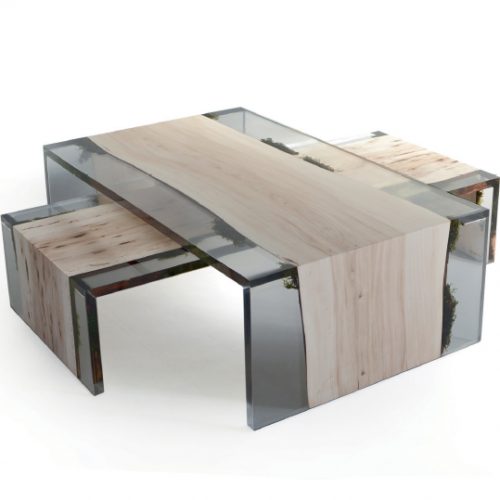 a coffee table on top of each other in resin and wood base in a light color tone on a white background