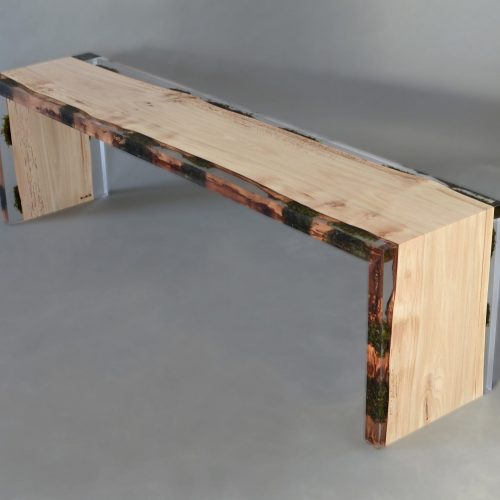 bench made with tree-based alcarol resin and light walnut wood on a gray background