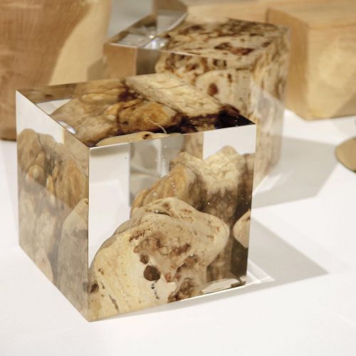 Two Karst Bookends with a geometric design, featuring a natural stone finish, set against a white background.