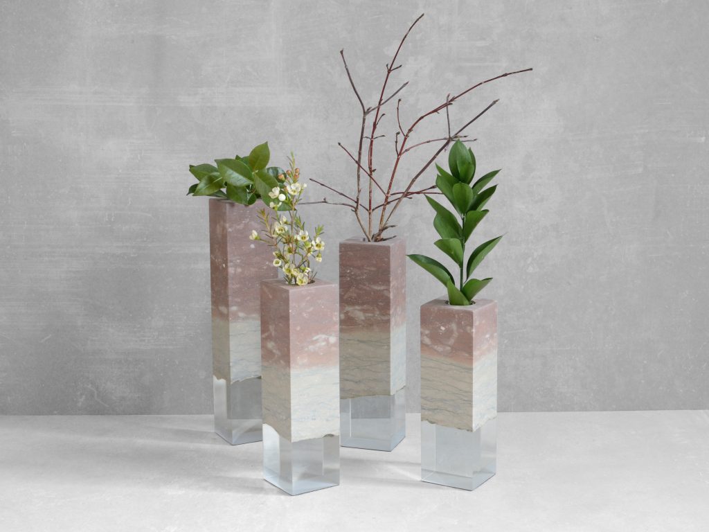 Four Dolomyth Vases with a rectangular design, made of white and orange stone with with a transparent resin inlay, set against a white background.