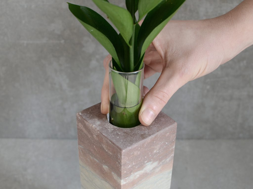 Dolomyth Vase with a rectangular design, made of white and orange stone with a transparent resin inlay, set against a white background.