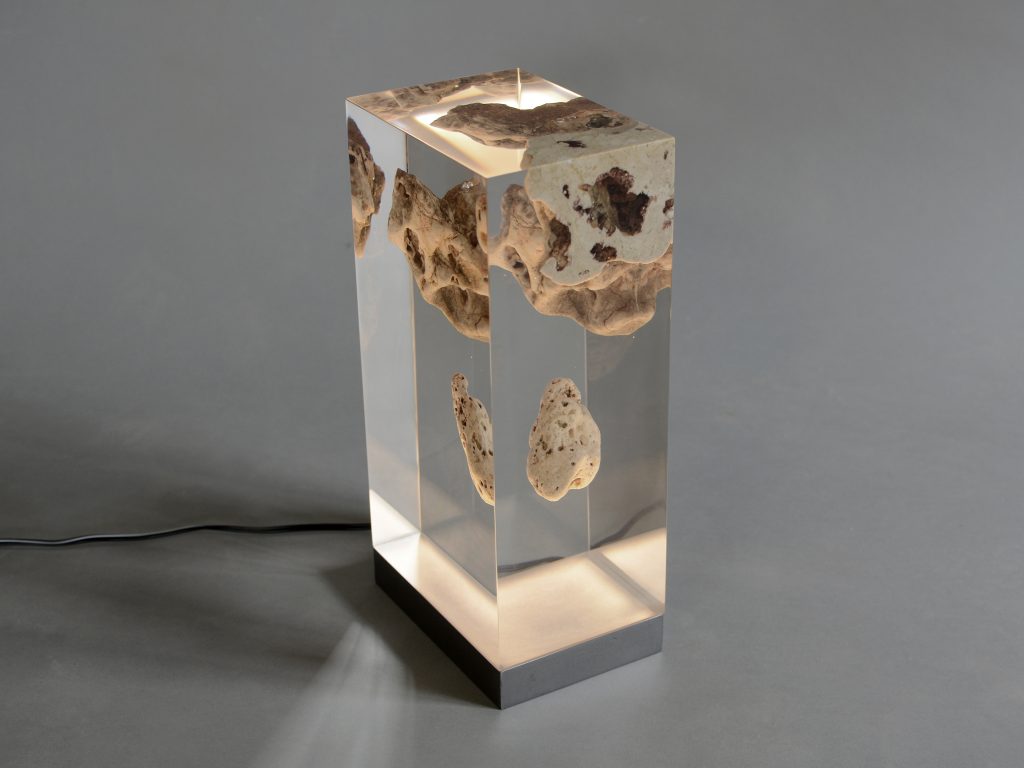 Floating Karst Lamp with a rectangular shape, featuring a natural stone base with a transparent resin inlay and a white lampshade, set against a white background.