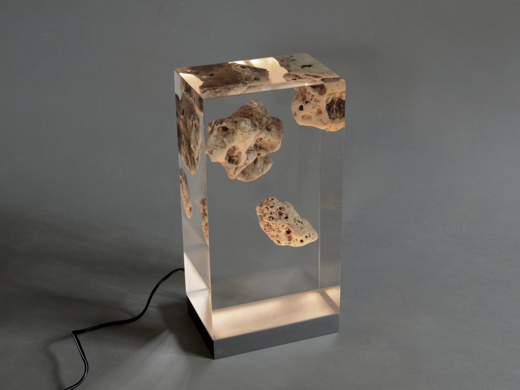 Floating Karst Lamp with a rectangular shape, featuring a natural stone base with a transparent resin inlay and a white lampshade, set against a white background.